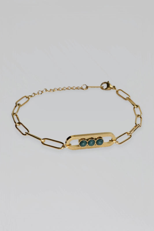Fine jewelry gold stainless steel bracelet with green accents – timeless custom piece